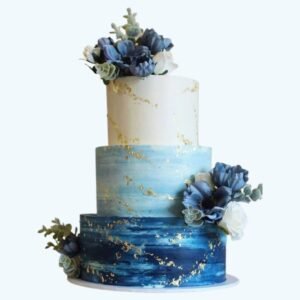 Blue gradient wedding cake with flowers